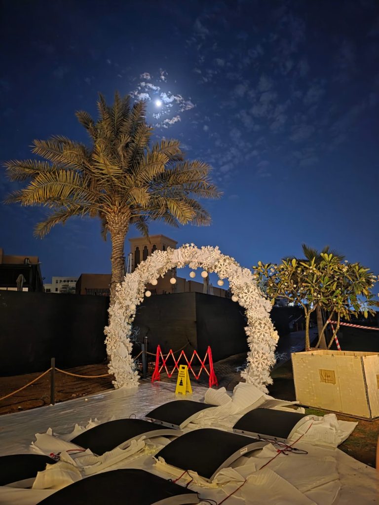 Professional Christmas decorations Dubai installation team styling a luxury festive showcase