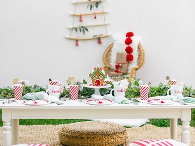 Kids Christmas theme decoration with colorful balloons, Santa props, and festive backdrop