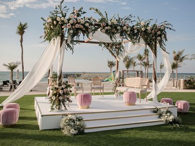 Personalized floral backdrop for wedding decoration Dubai photo booths.