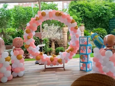 Custom organic balloon arch and photo booth setup for baby showers in Dubai
